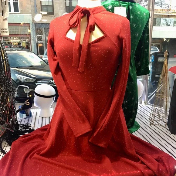 green emerald velvet dress Voodoo Vixen Heart Pocket Flare Dress in Pink main image 0